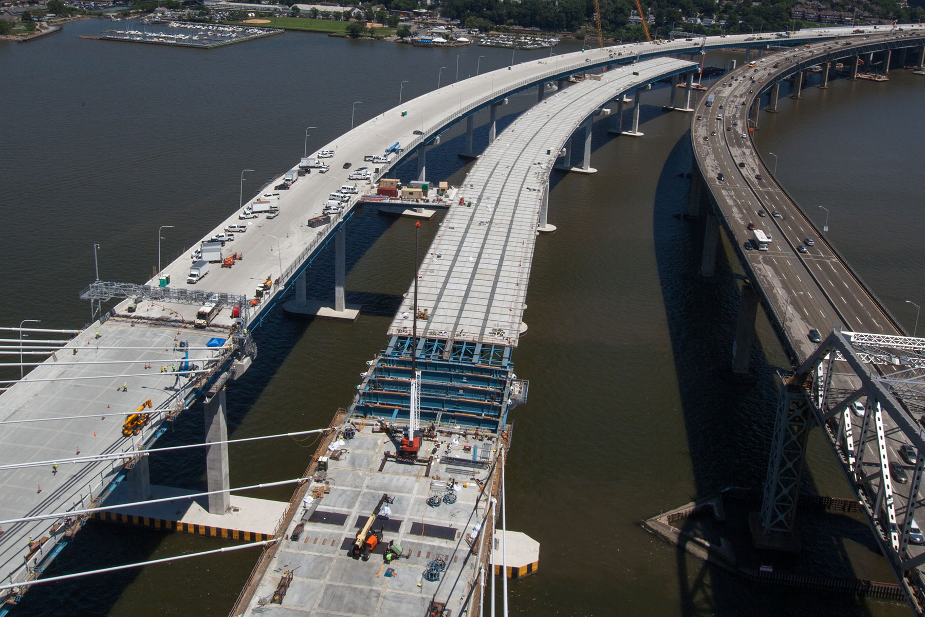 Crews working on eastbound span, final prep for westbound span opening