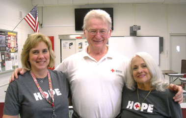 UNSUNG HEROES: Linda McMullan, Brian McMullan and Nanci Banninger, Members of the Red Cross Disaster Action Team (DAT)