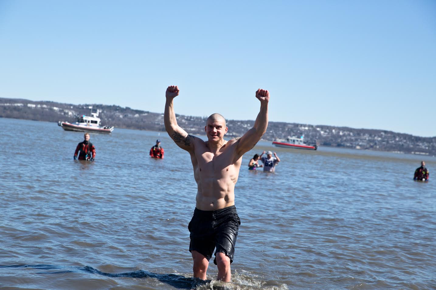 WHO SAYS IT’S COLD? POLAR SWIMMERS STAY WARM BY OPENING THEIR HEARTS TO CHARITY