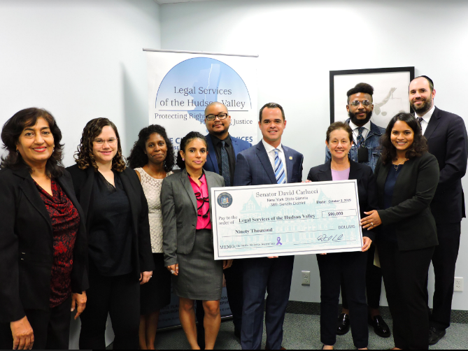 Senator Carlucci Presented a Check for $90,000 in State Funding to Legal Services of the Hudson Valley to Help Domestic Violence Survivors