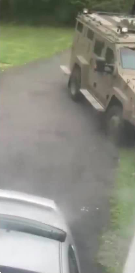 CAPTION – Photo of armored vehicle in driveway of Rose’s Warwick residence