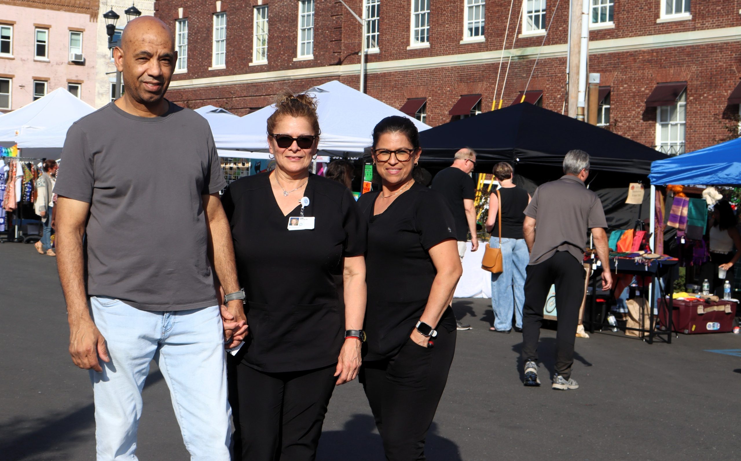 RCT-Jose Ruiz, Paula Robertson and Marllory Simon of New Jersey visit the Nyack Art Walk, the first of many events the village is sponsoring during the month of October. Photo-Kathy Kahn